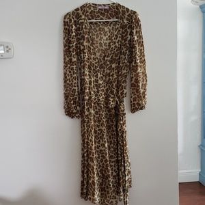 Calypso animal print sheer wrap dress